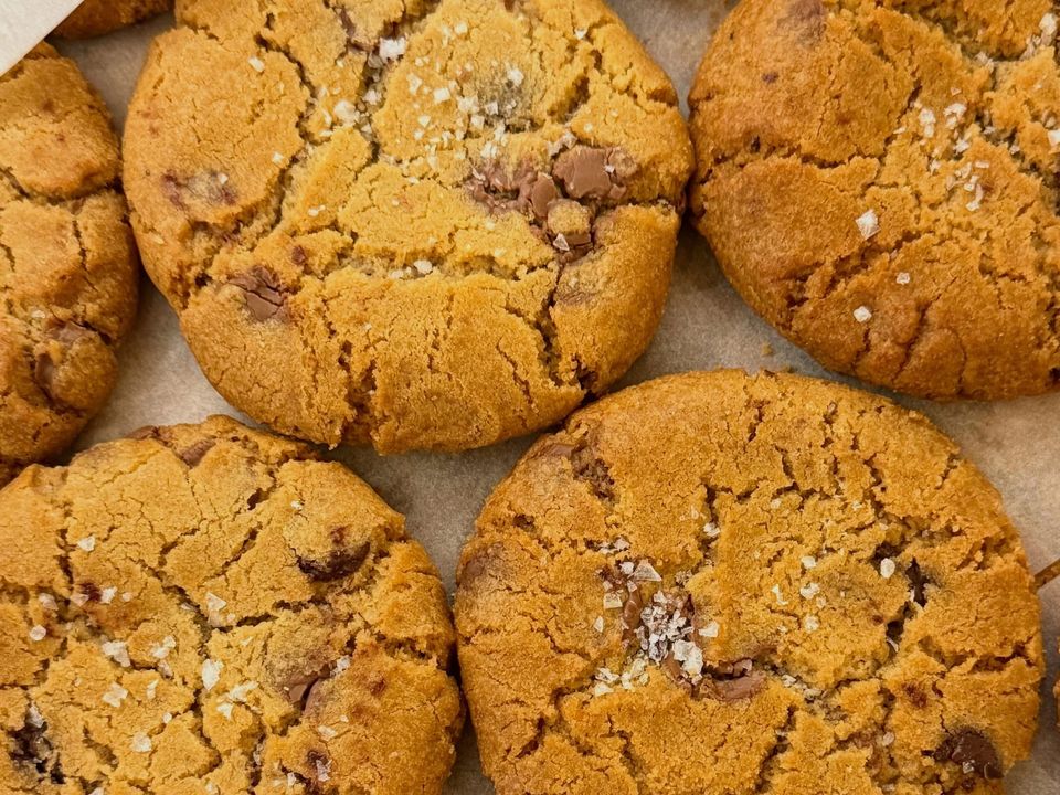 Chocolate chip cookies on baking paper